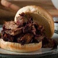 Jumbo Beef Sandwich · 7 oz. of smoked Burnt Ends or Brisket served on a bun