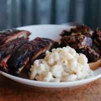 3 Ribs & 1 Meat & 1 Side · 3 slow smoked St. Louis style spareribs served with your choice of Pulled Pork, Chicken, Sau...