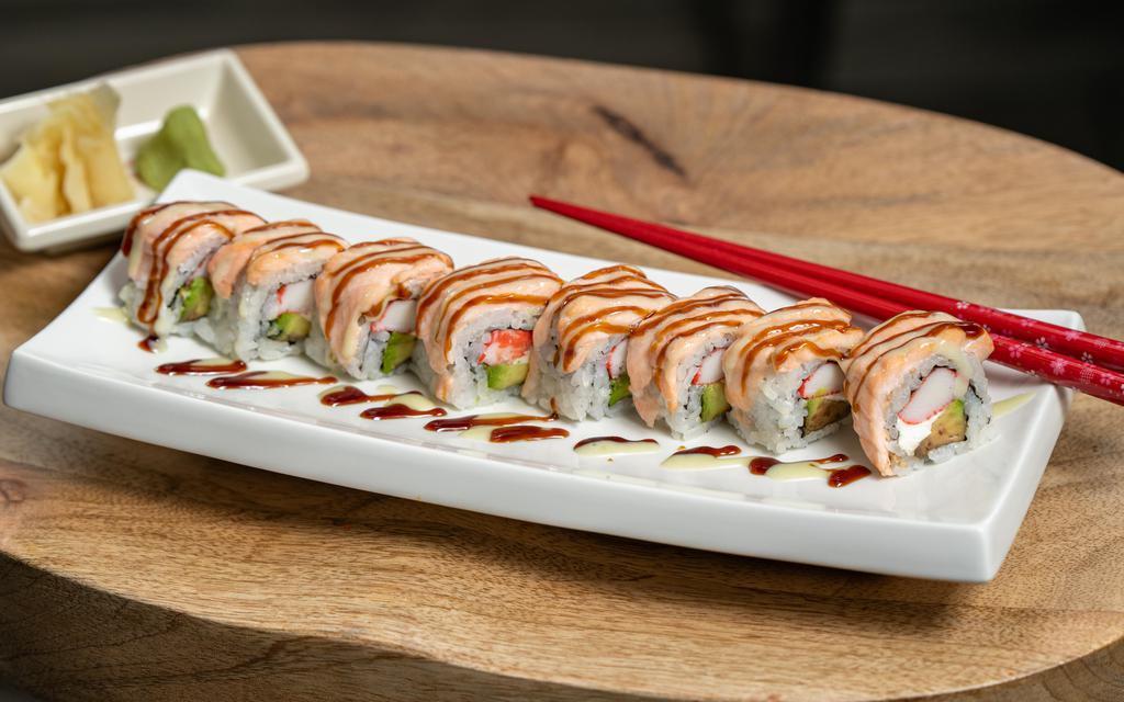 Baked Salmon Roll · Crab Stick, Cream Cheese, Avocado / topped with Salmon, Wasabi & Eel Sauce