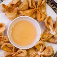 Crab Rangoons · (6) Fried wontons filled with imitation crab, cream cheese, green onion and red onion. Serve...