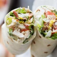 Chicken Shawarma Wrap · Most popular. Chicken marinated with house spice mix, cooked on a vertical broiler, served i...