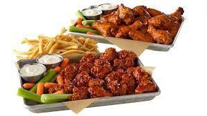 Party Vibes · 50 wings of your choice, 2 large fries, and 2 large onion rings