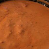 Chicken Tikka Masala · Tender boneless chicken breast cooked in a tandoor, then cooked in a creamy sauce with delic...