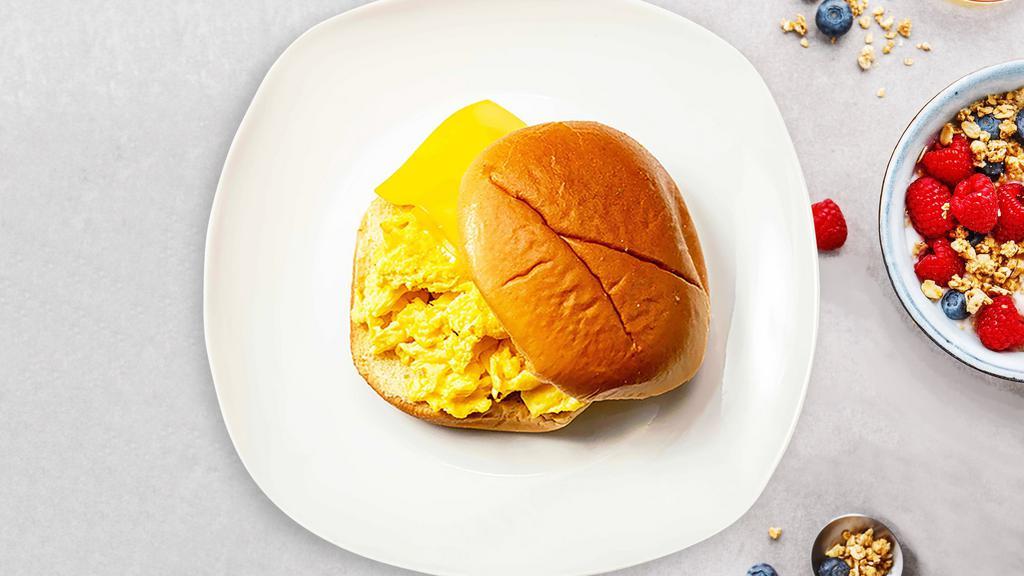 Cheesy Egg Breakfast Sandwich · Egg, and cheddar cheese on your choice of bread.