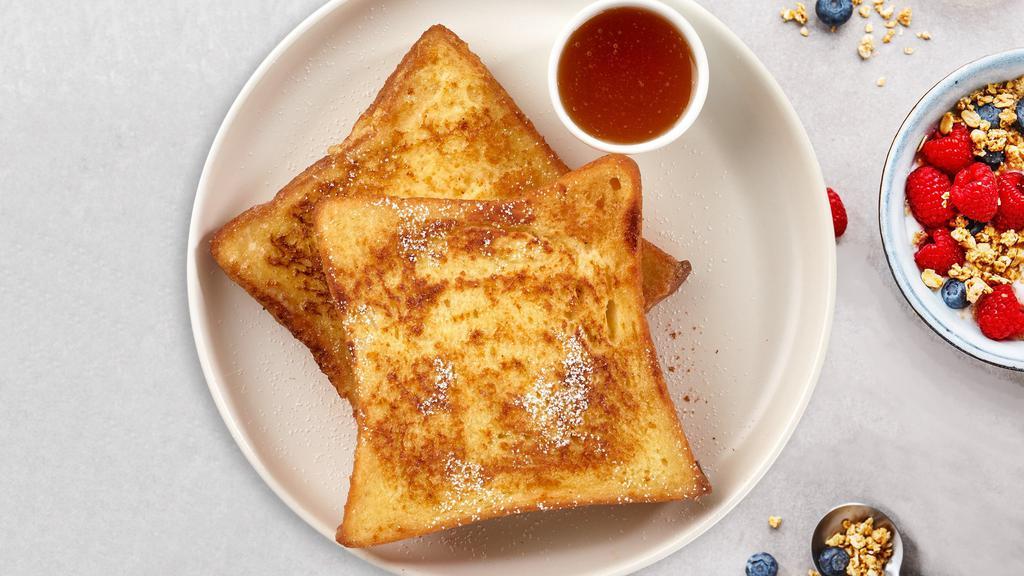 City Of Cinnamon Toast · Three slices of bread toast with cinnamon.