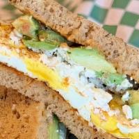 Avocado, Egg & Cheese · A buttery croissant with avocado, two fried eggs and choice cheese.