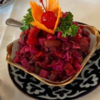Vinaigrette Salad · Potatoes, carrots, red onions, pickles, sour cabbage, red beans and diced beets mixed with o...