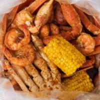 #A. Snow Crab & Headless Shrimp · Each pound seafood comes with one corn and two potatoes.