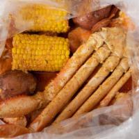 Snow Crab (Daily Special) · 1/2 lb snow crab, 1/2 lb headless shrimp, 1/4 lb sausage, two corn, and two potatoes.
