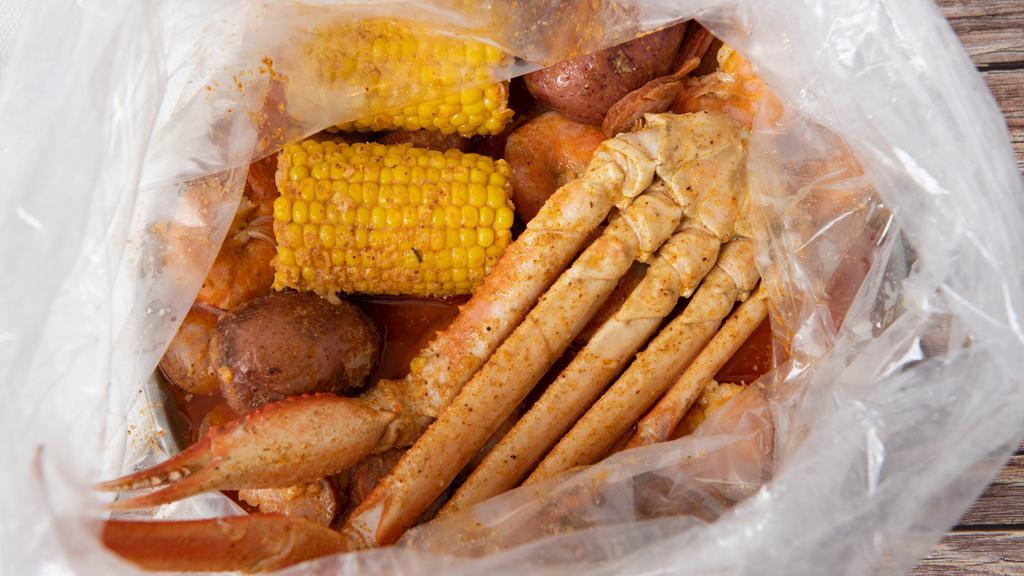 Snow Crab (Daily Special) · 1/2 lb snow crab, 1/2 lb headless shrimp, 1/4 lb sausage, two corn, and two potatoes.