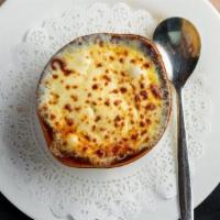Three Onion French Soup · 3 onions, sherry wine broth, topped with seasoned croutons, imported Swiss cheese and mozzar...
