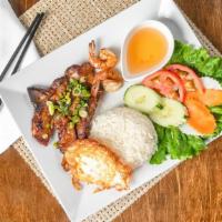 Chateau Rice Platter Special - Cơm Đặc Biệt · Two grilled shrimp, fried egg and choice of grilled pork, pork chop, grilled chicken, grille...