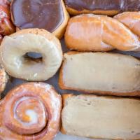 Baker'S Assorted Dozen · An assortment of 13 favorites we pick. Includes assorted bars, cake donuts, rings, fruit and...