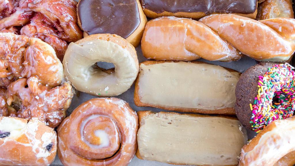 Baker'S Assorted Dozen · An assortment of 13 favorites we pick. Includes assorted bars, cake donuts, rings, fruit and cream filled, fritters, and more.