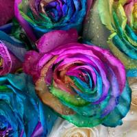 Rainbow Roses · No better way to brighten someone’s day than to give a beautiful bouquet of rainbow roses. 
...