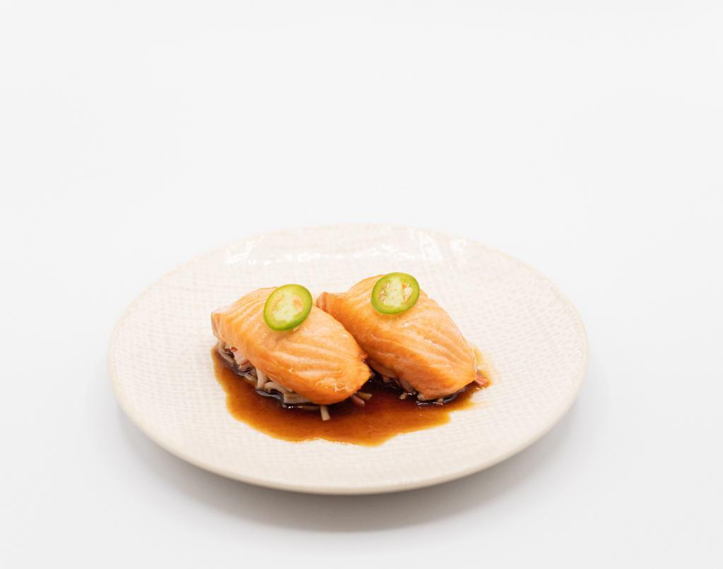 Crabby Salmon Nigiri · 2 pc - Baked salmon, spicy crab mix, serrano peppers, ponzu sauce
