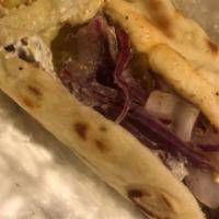 Lamb & Falafel Wrap · Lamb and falafel, on pita bread, side salad, pickles, red onion, hummus, tahini, tzatziki, a...