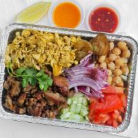 Combination Plate · Lamb and chicken with basmati rice, side salad, garbanzo chickpeas, pickles, red onion, lime...