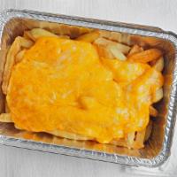 Cheese Fries · Fully loaded plate of fries topped with cheese, salt and pepper, ketchup, tahini, tzatziki a...