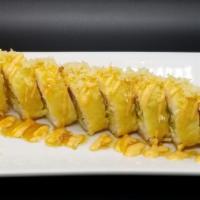 Tiger Roll · Shrimp Tempura, cream cheese, avocado, mango. Rolled uramaki style with soy sheet. Topped wi...