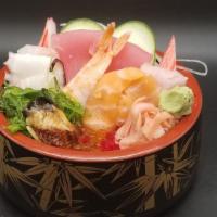 Chirashi Bowl  · A traditional assortment of sashimi, seafood and more served over a bed  of sushi rice, incl...