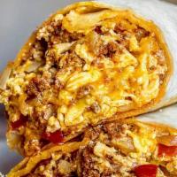 Breakfast Burrito  · Our delicate tortillas filled with shredded hash browns, onions, bacon, red pepper and fluff...