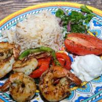 Shrimp Kebabs · Grilled shrimp and vegetables, rice.