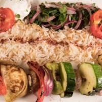 Veggie Kebabs · Grilled mushrooms, onion, squash, eggplant, tomato, pepper, garlic whip, rice.
