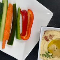 Veggie Hummus · Plain hummus served with cucumbers, green peppers and carrots.