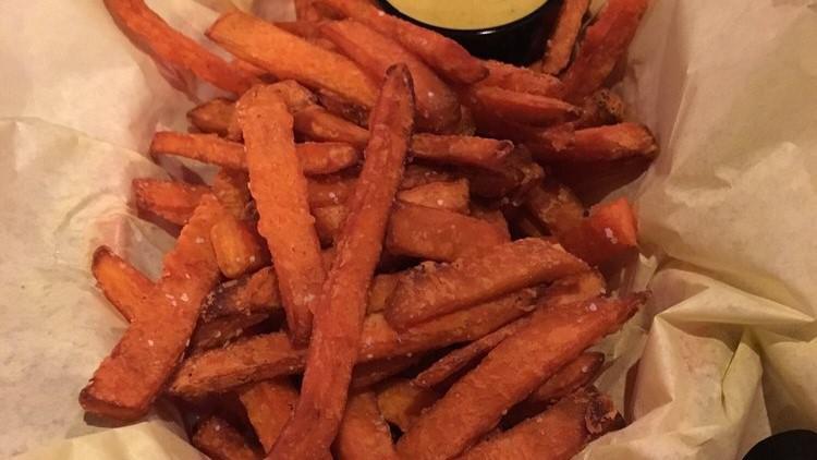 Sweet Potato Fries · Crispy sweet potato French fries with a curry aioli dipping sauce.