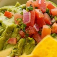 Guacamole · Topped with Pico De Gallo, and served with tortilla chips