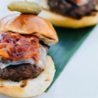 Beef Sliders · (3) Hand-crafted Angus beef sliders topped with provolone and tomato-bacon jam. Served on 3 ...