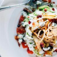 Wedge Salad · Iceberg lettuce-bleu cheese crumbles-grilled apples-crispy shallots-tomatoes-candied bacon-b...
