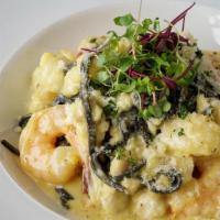 Squid Ink Seafood Linguini · lobster - shrimp - scallops - jumbo lump crab meat - saffron garlic cream sauce