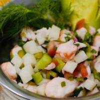 Shrimp Ceviche · Fresh lime, cucumbers, red onion, jicama, serrano, and cilantro, crispy wonton