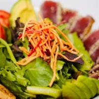 Seared Ahi Tuna Salad · Mixed organic greens, avocado, tomatoes, Persian cucumber, shredded fresh carrots and beets ...