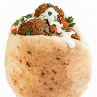 Falafel Pita · Authentic homemade jerusalem style falafel, GF.   served in a pita with homemade hummus , is...