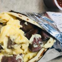 Refried Beans, Egg & Cheese Taco · Organic eggs, organic refried beans, and  cheese

White tortilla is organic and made per ord...