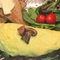 Greek Omelette · Organic eggs, feta cheese with kalamata black olives and roasted red bell pepper.