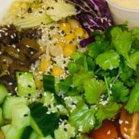 Middle East Buddha Bowl · Homemade hummus, organic brown rice & organic quinoa, organic red cabbage, chickpeas, organi...