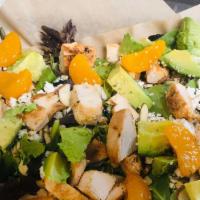 Orange & Avocado Salad · Organic spring greens topped with mandarin oranges, diced avocado, goat cheese, toasted almo...