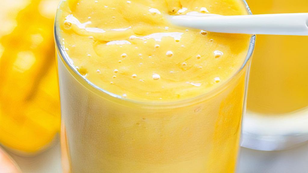 Orange Mango Smoothie · Orange juice, banana, organic mango, pure whey protein.