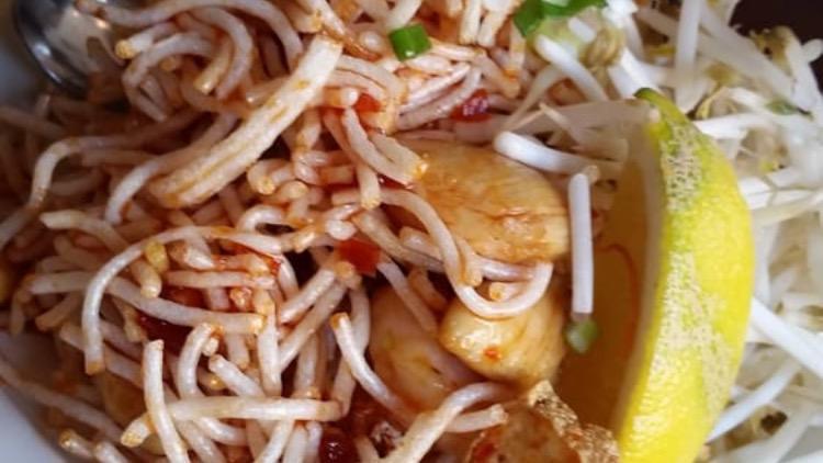 Mee Krob · Savory crispy noodles blended with chicken and shrimp or tofu, and bean cake garnished with bean sprouts.