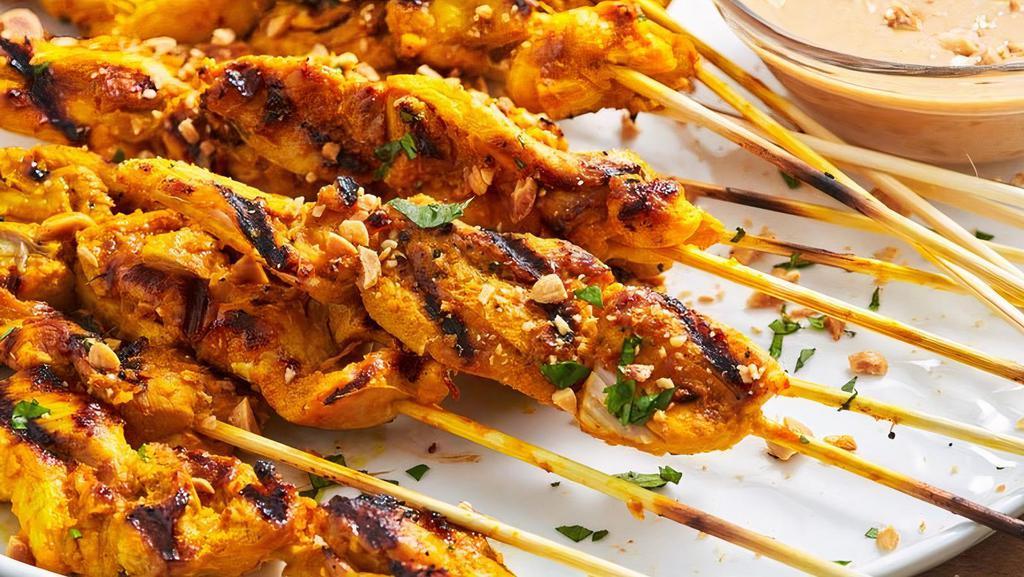 Chicken Satay · Marinated in herbs and spices served with peanut sauce