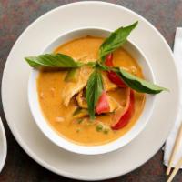 Panang Curry · Bell peppers, sweet basil, peas & diced carrots - Medium Spice