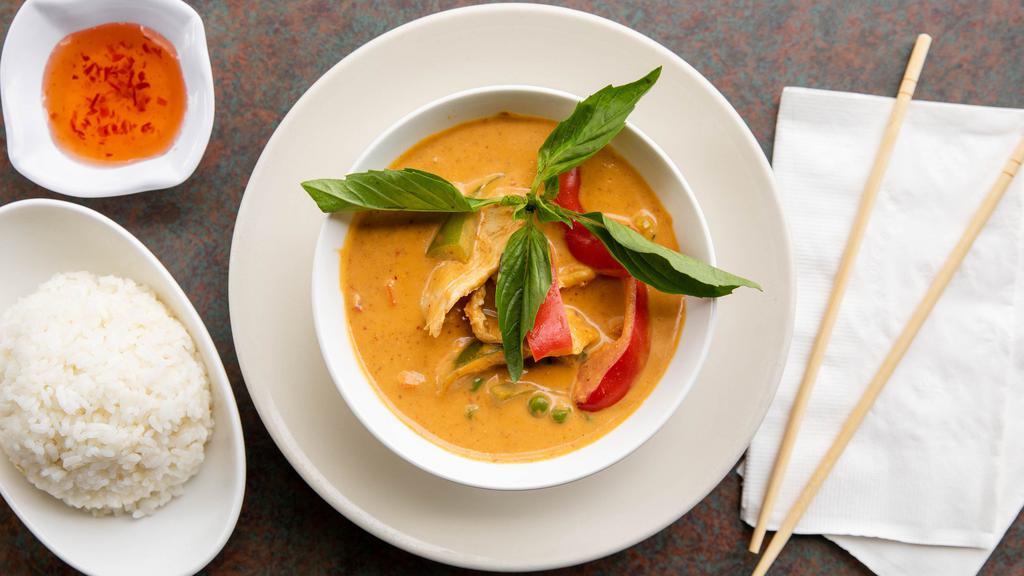 Panang Curry · Bell peppers, sweet basil, peas & diced carrots - Medium Spice
