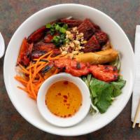 Bun Dac Biet - Special Bun · Vermicelli Noodle with chicken, pork, grilled shrimp and egg roll with a side of fish sauce