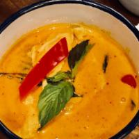 Red Curry  · Your choice of meat, sautéed with red curry paste, coconut milk, pumpkin and basil leaves.