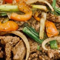 Black Pepper Beef  · Sliced flank steak sautéed with onion, bell pepper, scallion, and black pepper served with c...