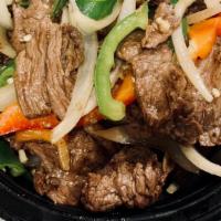 Pad Prik Sod · Your choice of meat sautéed with bell pepper, finger hot chili and onion served in black bro...